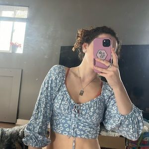 Mid length sleeved floral blouse